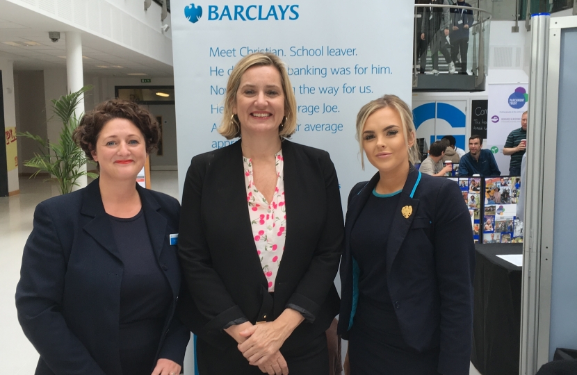 Amber is pictured with staff members from Barclays Bank