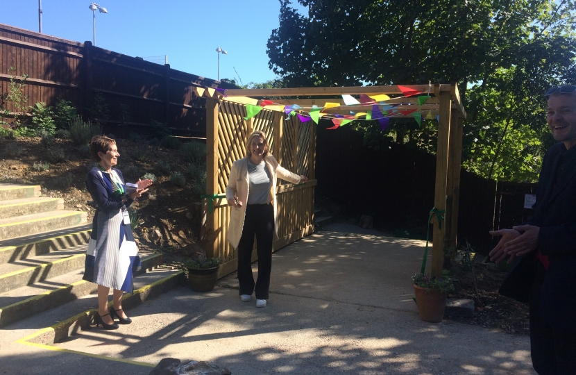 Amber is pictured with Carole having just cut the ribbon and officially opened the pergola